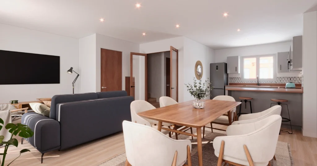 Open-plan lounge space for a new home designed with a coastal-inspired palette, neutral colours, and layered natural textures.